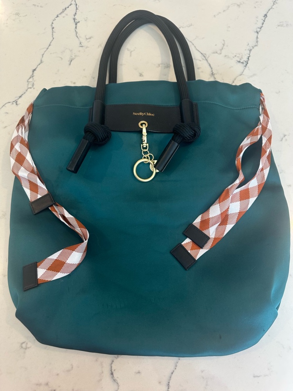 See By Chloe Teal Nylon Tote with Brown & White Plaid Straps to untreated spots